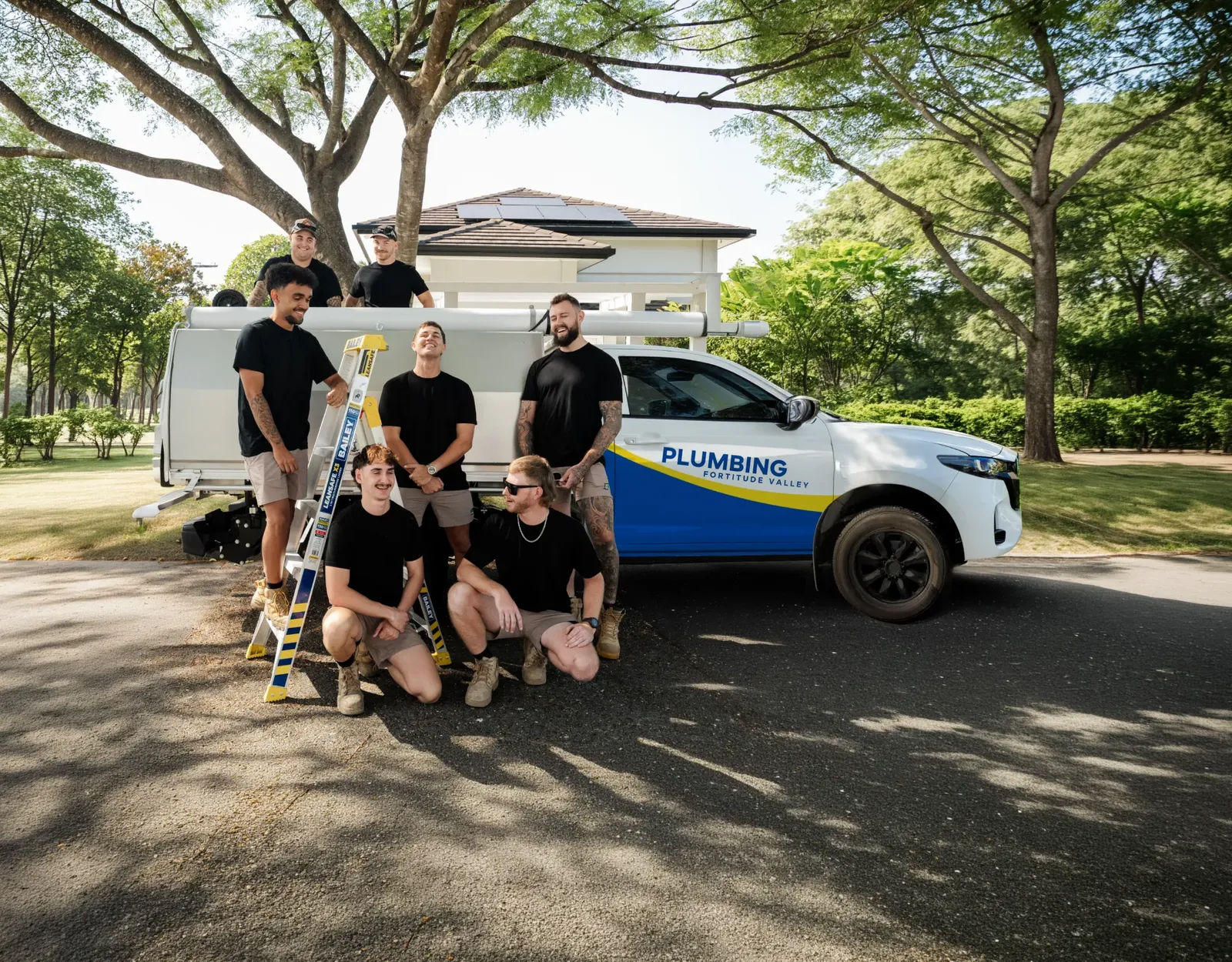 Plumbing Fortitude Valley ute and team